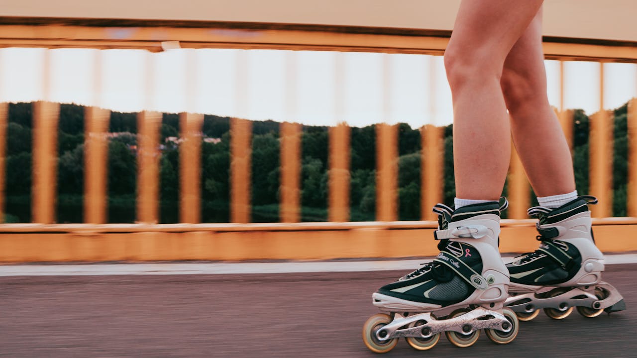 Close-up of a woman rollerblading on a bridge in Vilnius, Lithuania.